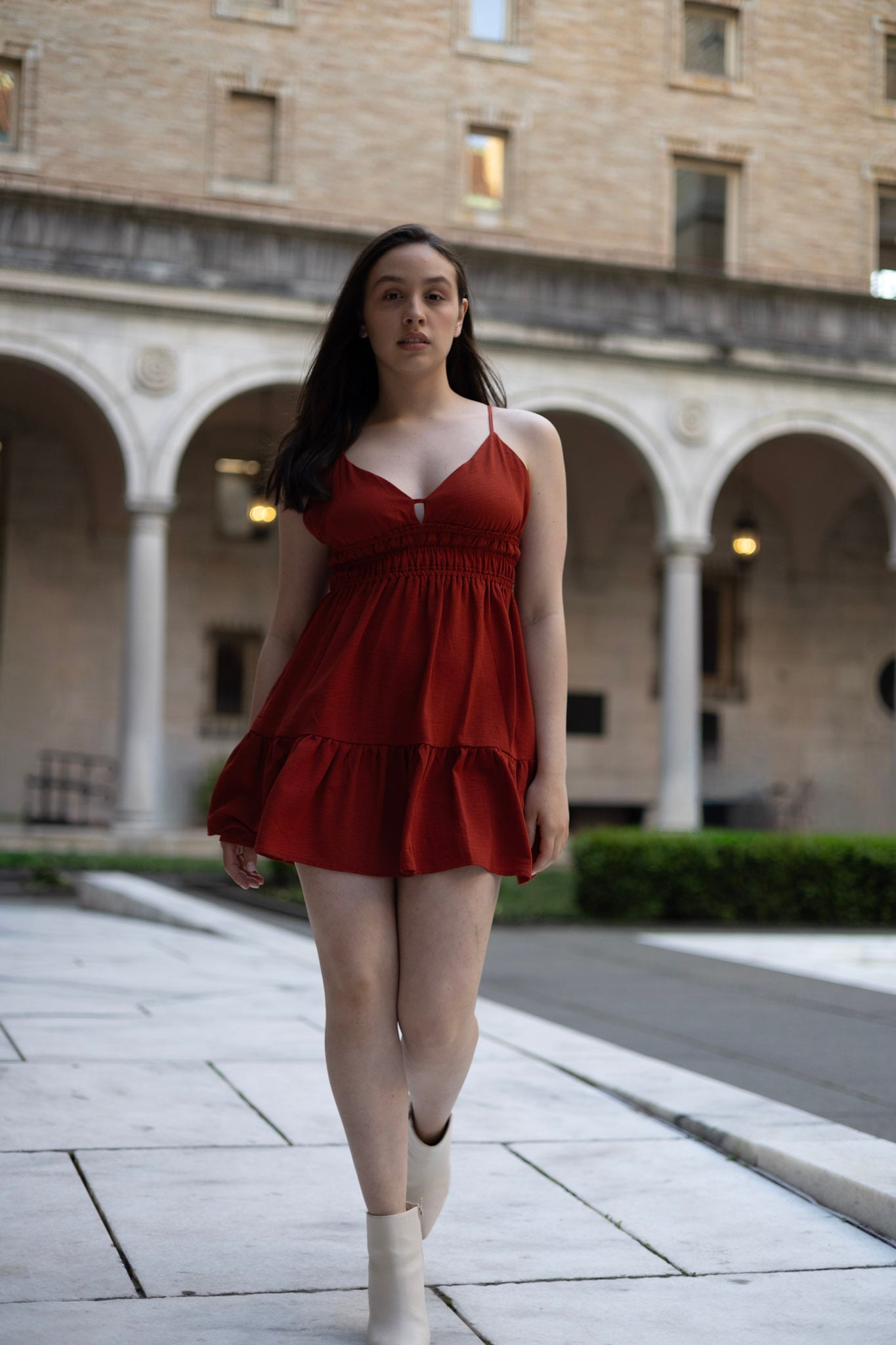Editorial portrait beneath the arches